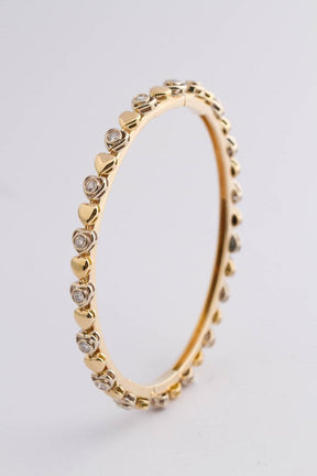 Geel gouden bangle armband rond bezet met briljanten