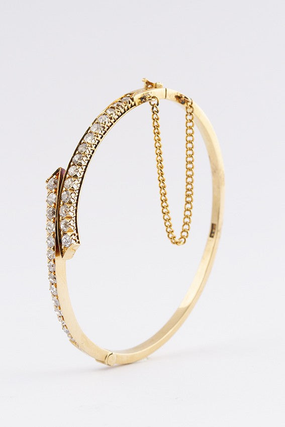 Gouden slag slaven armband met 28 briljanten