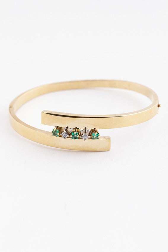 Gouden slag slaven armband met briljant en smaragd