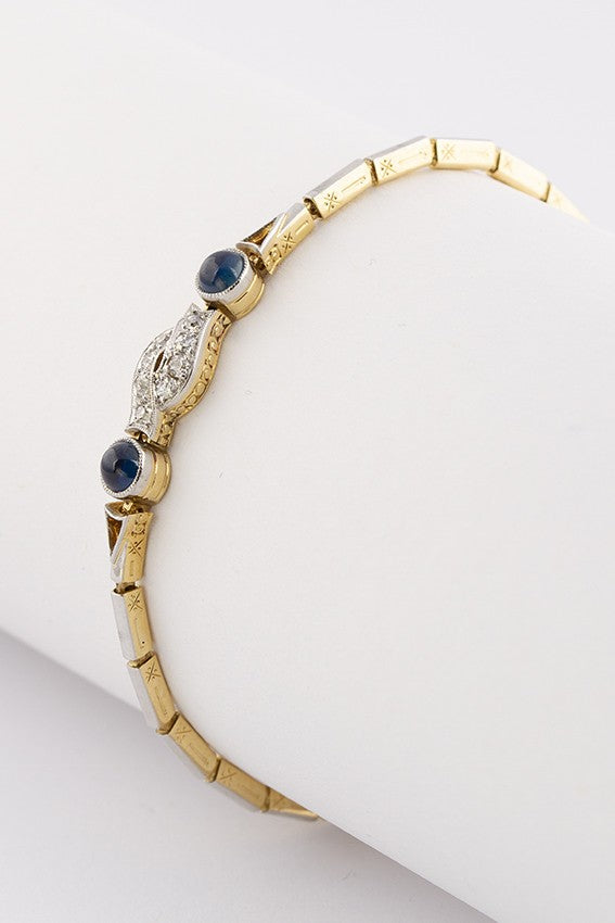 9 krt. schakel armband met saffier en briljant