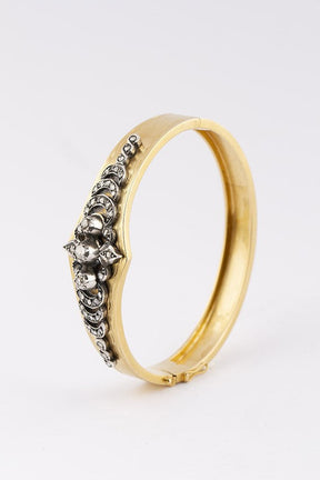 Antique gold slave bracelet with a silver applique with diamonds