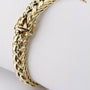 Gold link bracelet.