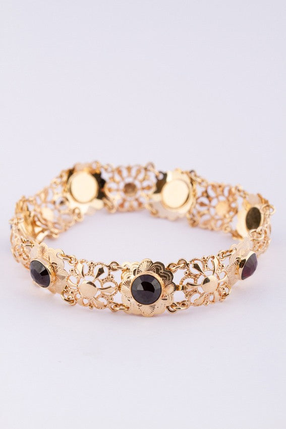 Gold link bracelet with garnets