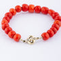 Red coral bracelet with gold clasp