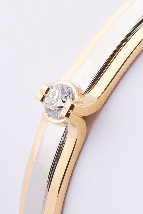 Gouden massieve slaven armband van het merk: Le Chic met een briljant