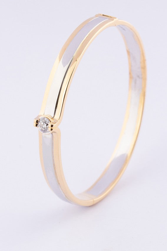 Gouden massieve slaven armband van het merk: Le Chic met een briljant