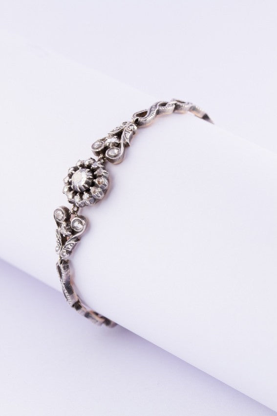 Gold/silver link bracelet with rose-cut diamonds.