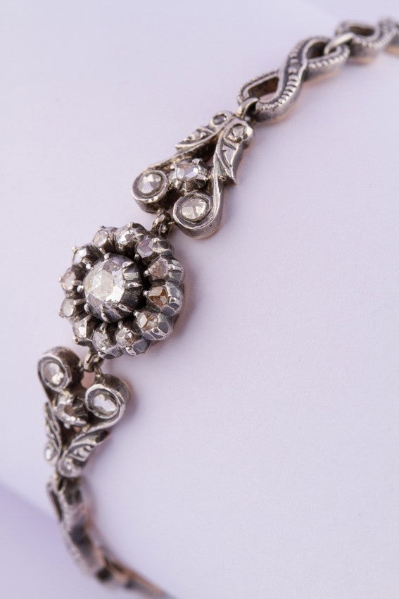Gold/silver link bracelet with rose-cut diamonds.