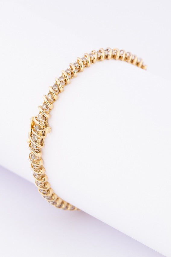 Gouden tennis schakel armband met briljanten