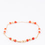 Gouden armband met bloedkoralen