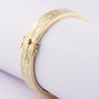 Gold engraved slave bracelet with hinge closure