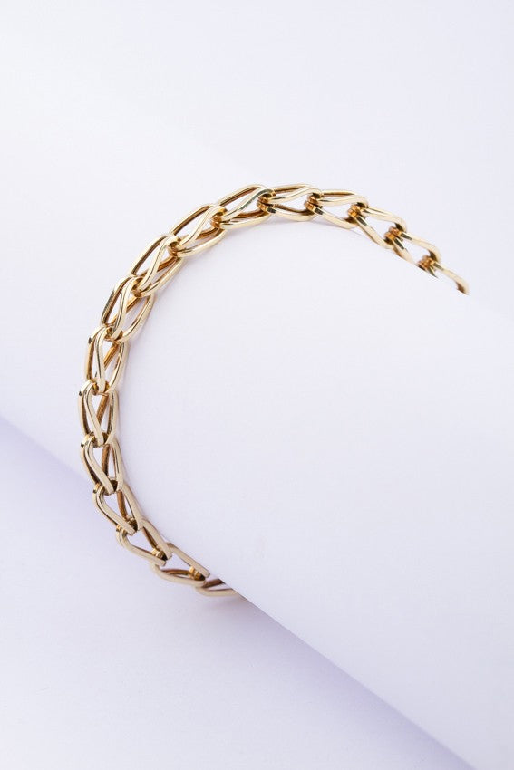 Gold link bracelet with safety chain