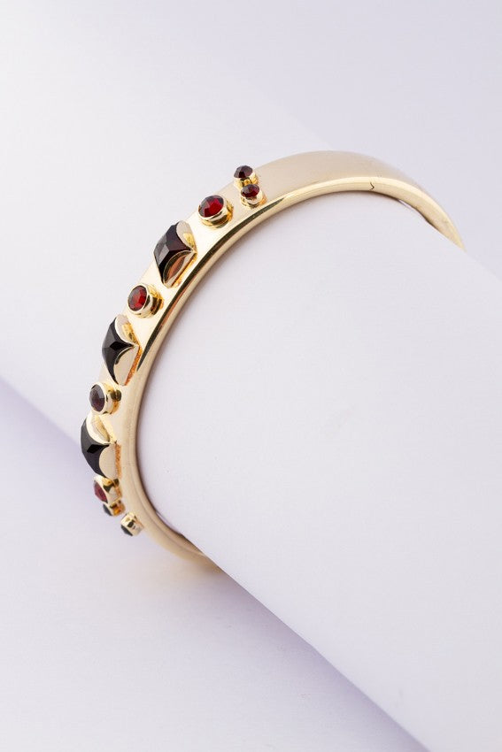Gouden bangle armband met granaten