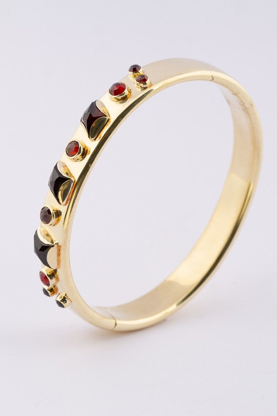 Gold slave bracelet and garnets