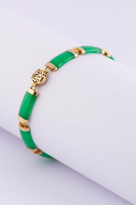 Gold link bracelet with jade