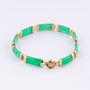 Gold link bracelet with jade