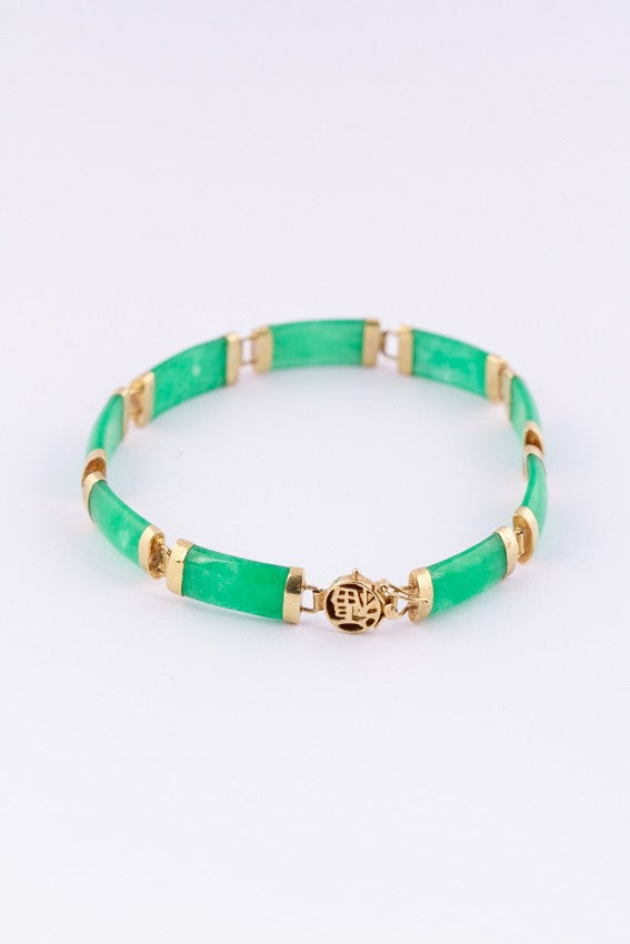 Gold link bracelet with jade