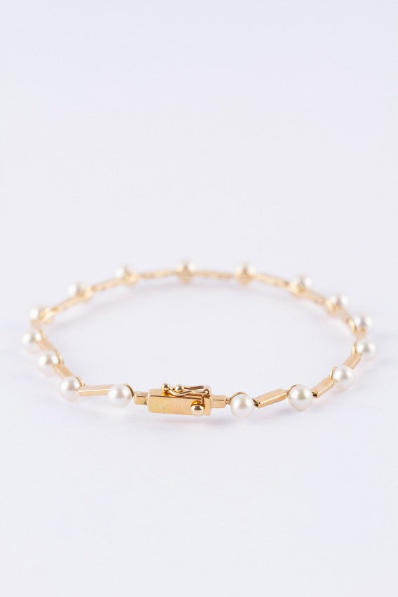 Gouden schakelarmband met parels
