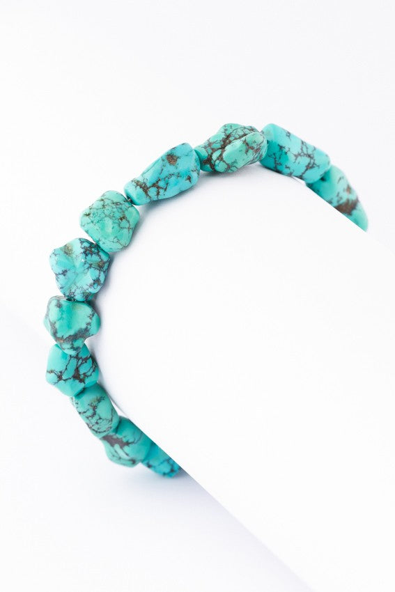 Turquoise bracelet with gold clasp