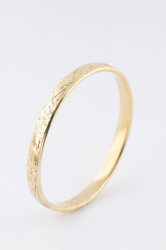 Gold engraved slave bracelet