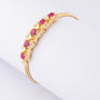 Gouden armband met robijnen, briljanten en diamanten