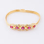 Gouden armband met robijnen, briljanten en diamanten