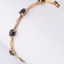 Gold link bracelet with sapphires
