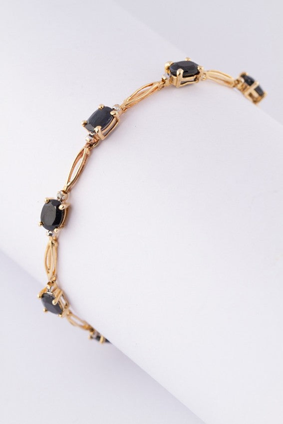 Gold link bracelet with sapphires