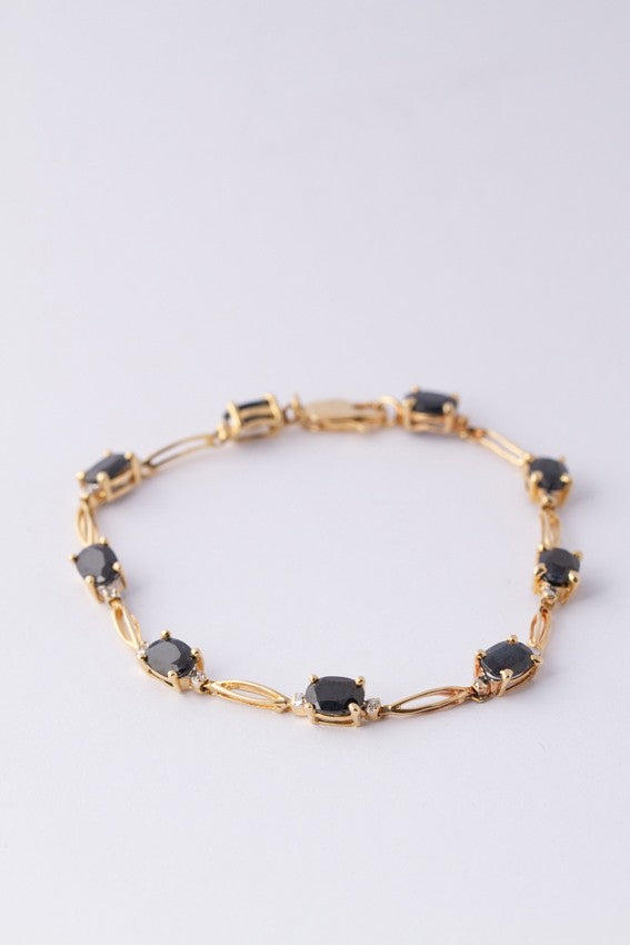 Gold link bracelet with sapphires
