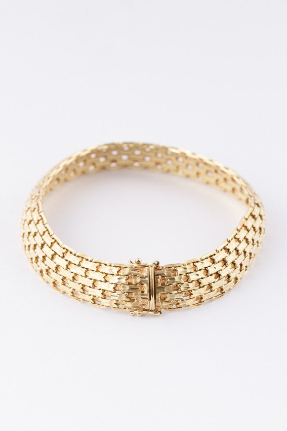 Gold braided link bracelet