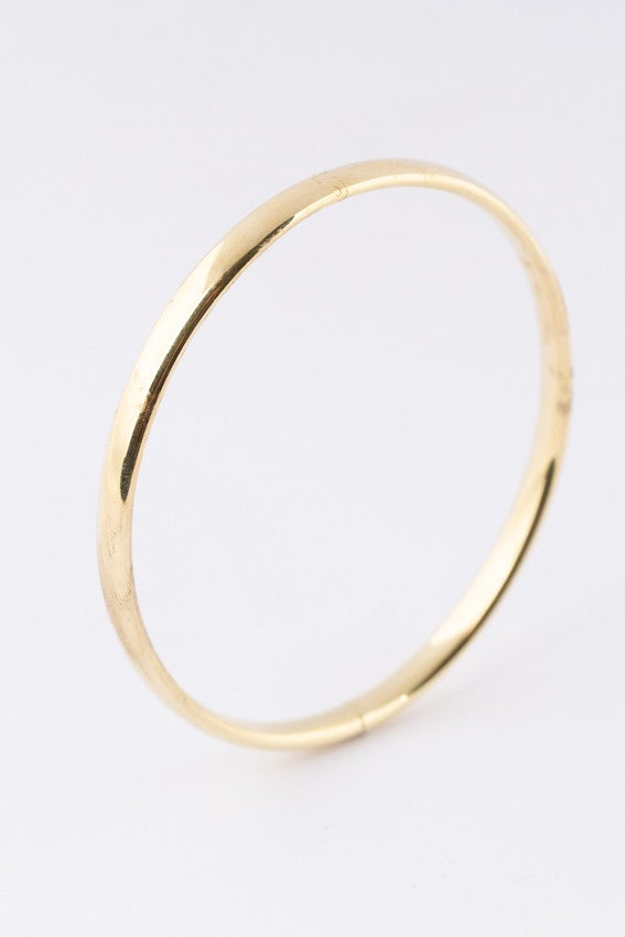 Gold bangle bracelet with hinge closure