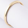 Gold bangle with hinged closure