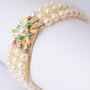 3-strand cultured pearl bracelet with gold clasp