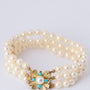 3-strand cultured pearl bracelet with gold clasp