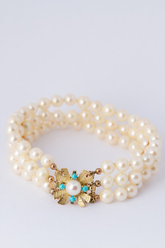 3-strand cultured pearl bracelet with gold clasp