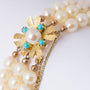 3-strand cultured pearl bracelet with gold clasp