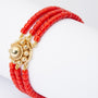 Blood coral bracelet with a gold Zeeland knot closure