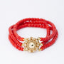 Blood coral bracelet with a gold Zeeland knot closure