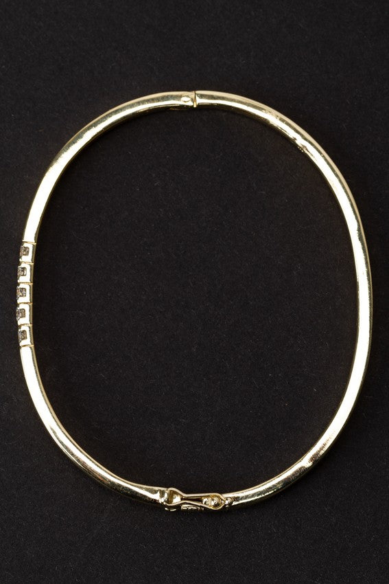 Gouden bangle met 5 briljanten (totaal ca. 0.50 ct.)