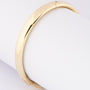 Gold bangle with hinge closure