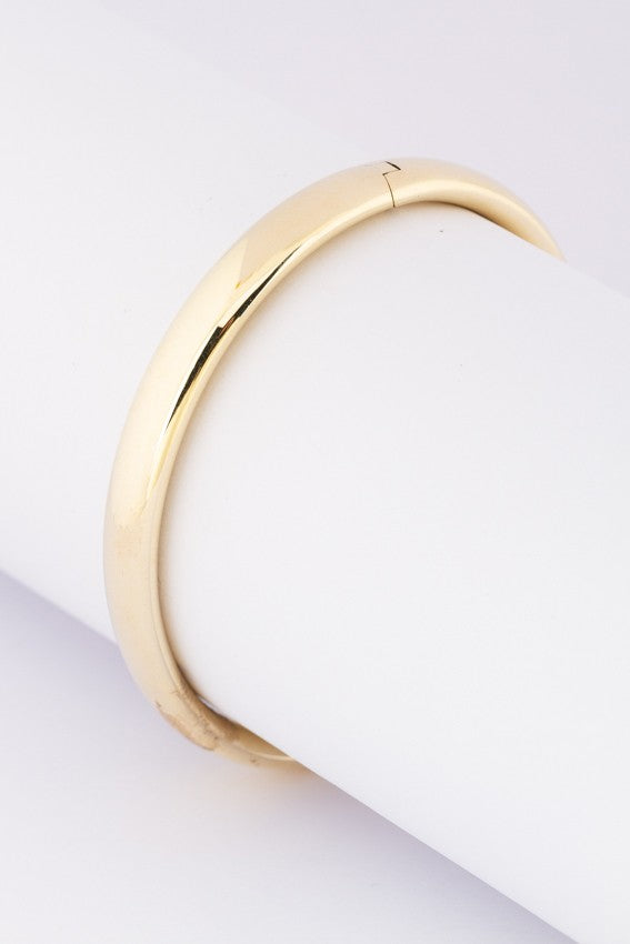 Gold bangle with hinge closure