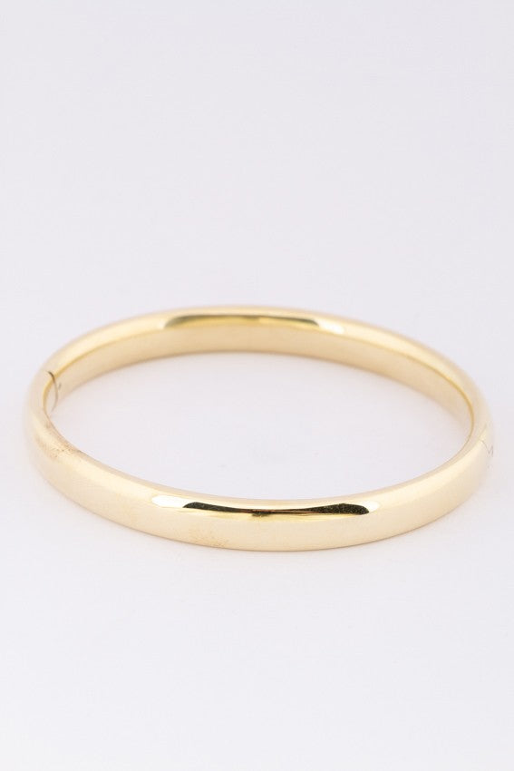 Gold bangle with hinge closure