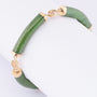 Gold link bracelet with jade