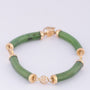 Gold link bracelet with jade
