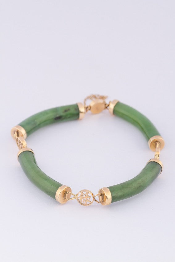 Gold link bracelet with jade