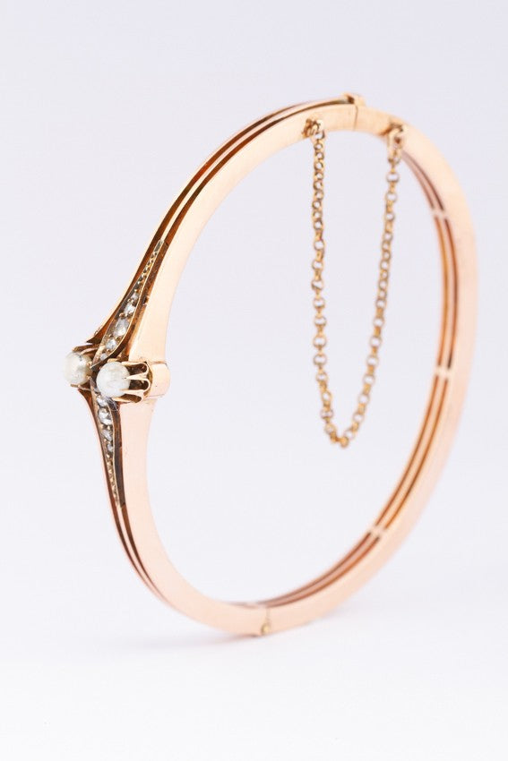 Gouden spangen armband met parels en diamanten