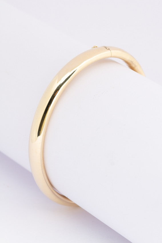 Gold bangle with hinge closure