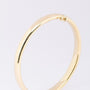 Gold bangle with hinge closure