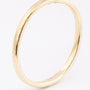 Gold bangle with hinged closure