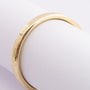 Gold bangle with hinged closure